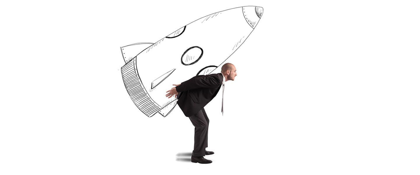 give-your-marketing-a-boost man with rocket on his back - give your work a boost